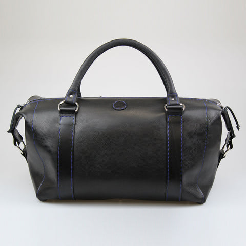 Fully lined in Herringbone Harris Tweed Travel Bag in waterproof English full grain leather Made by Sam Brown London UK