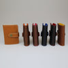 Card wallets in Tan-Black-Brown with soft leather lining in striking colours Hand made by Sam Brown London British Made