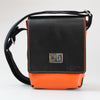 The-compact-traveller-bag orange-hermes-leather with black-bridle-leather with nickel-fixings-made-by-Sam-Brown-London England