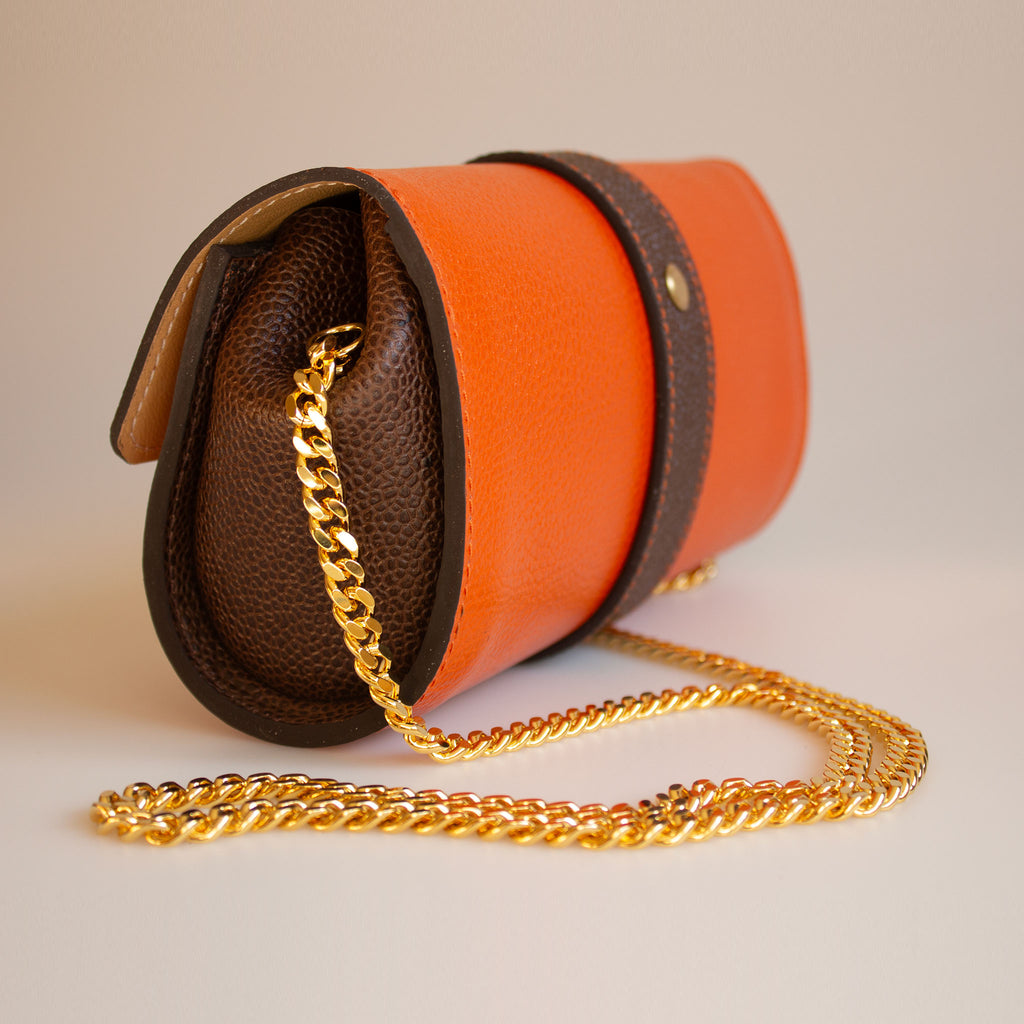 The Chelsea Clutch in Orange & Brown Grained Leather