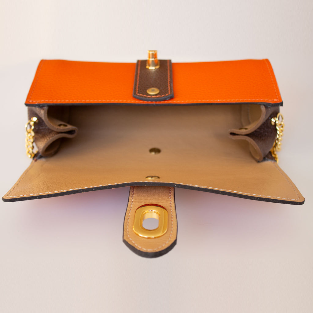 The Chelsea Clutch in Orange & Brown Grained Leather