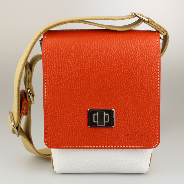 The-compact-traveller-bag orange-hermes-leather with white-leather with nickel-fixings-made-by-Sam-Brown-London England 