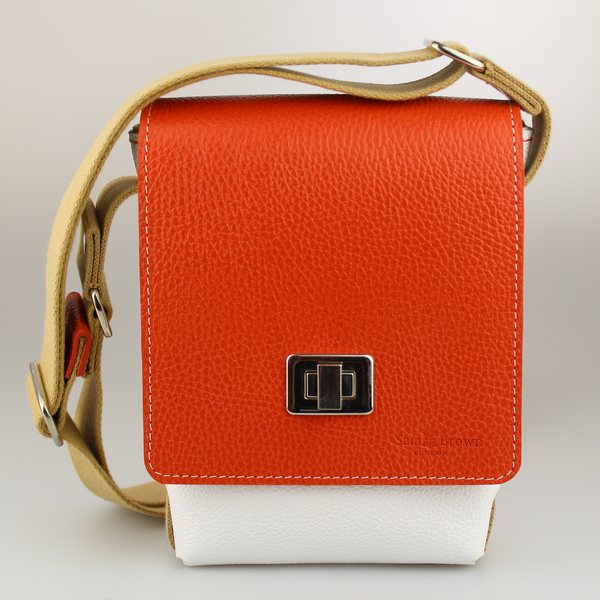 The-compact-traveller-bag orange-hermes-leather with white-leather with nickel-fixings-made-by-Sam-Brown-London England