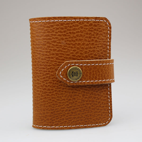 Elegant Tan leather card wallet to keep cards secure. Hand-crafted from British full-grain leather,  two-toned for striking effect. Hardware in brass Lined in soft ivory leather made by Sam Brown London Wiltshire UK