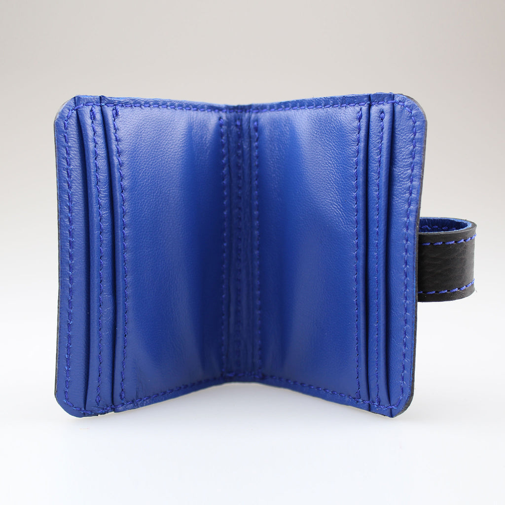 Elegant Black leather card wallet to keep cards secure. Hand-crafted from British full-grain leather,  two-toned for striking effect. Hardware in nickel Lined in soft blue leather made by Sam Brown London Wiltshire UK