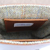 Internal image of lining for The Cartridge bag - in Harris Tweed with 2 leather pockets Made by Sam Brown London