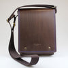 Brown full grain leather Bag with blue stitch around edge of long flap with 2 magnetic clasps. Made by Sam Brown London