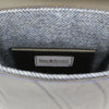 Yorkshire Herringbone tweed lining with 2 black leather pockets - good for mobile phone. Made by Sam Brown London UK