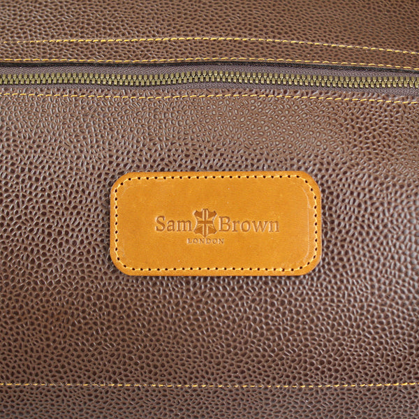 close up of external zip pocket for essential items like your phone passport