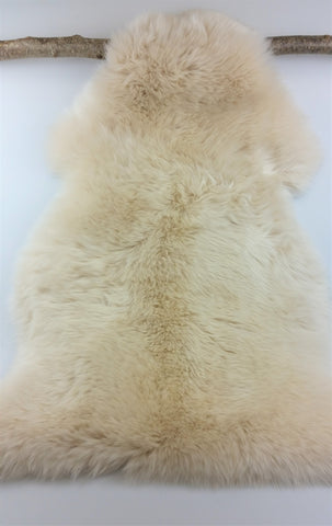 long haired warm creamy sheepskin fleece rug tanned in Devon UK ORDER from Flax and Fleece Co 07968310883