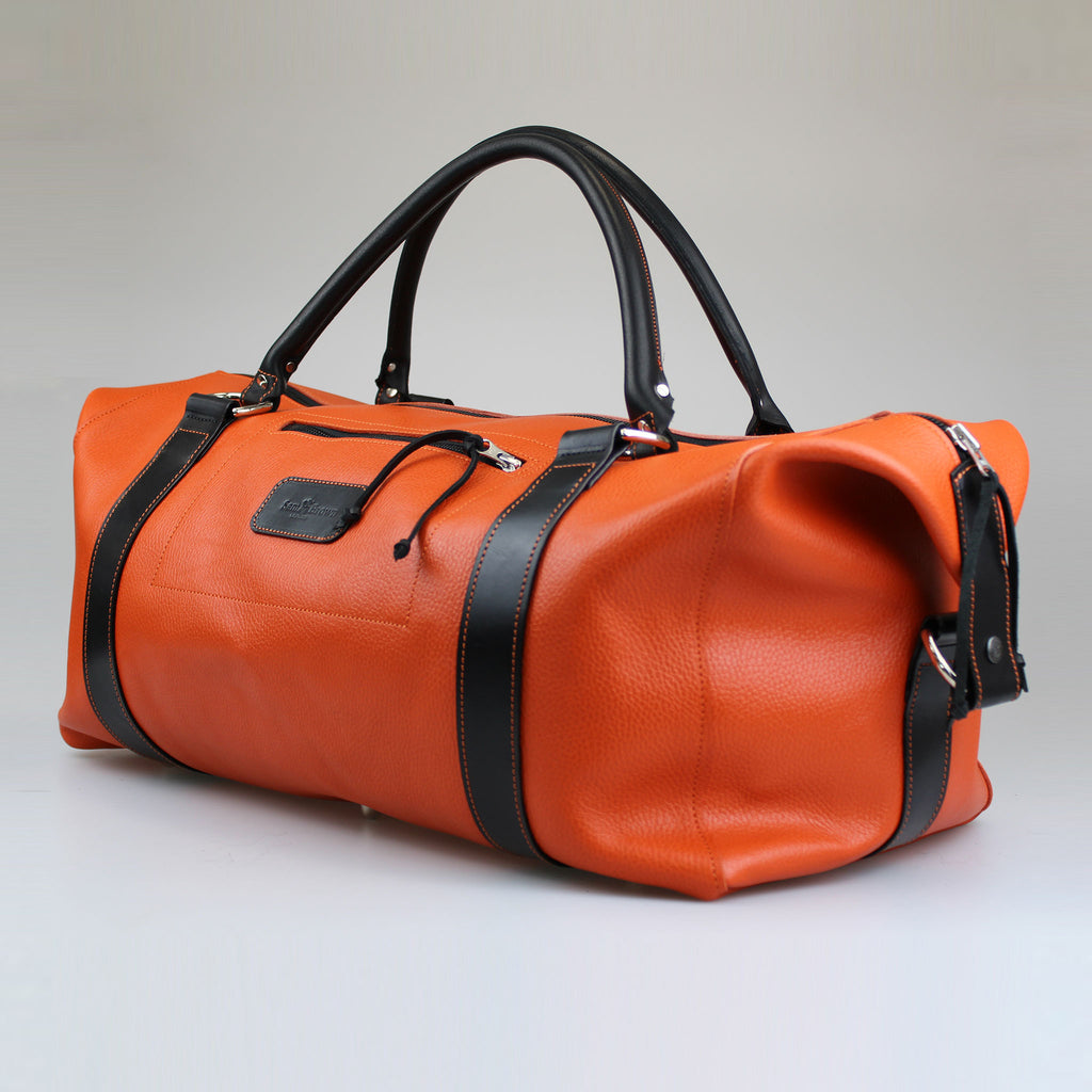Sam-Brown-London-orange-leather-with-black-handles -and-trim-weekend-luggage-bag