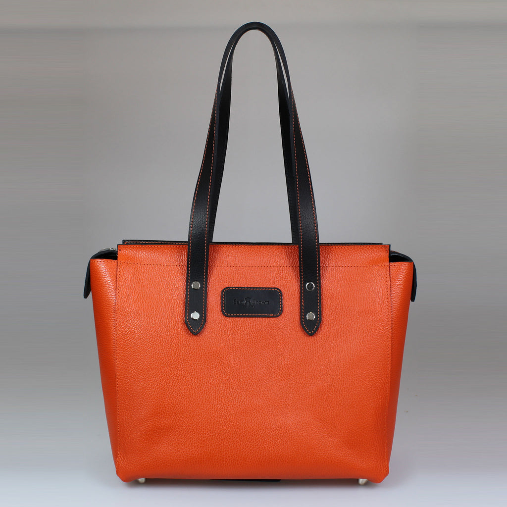 Striking_orange-grain_calfskin_large_tote_bag_black_smooth_leather_handles