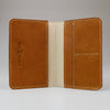 Tan full grain passport_wallet_with_ivory_leather_spine_ivory_stitching-MADE_IN_England_Sam_Brown_London