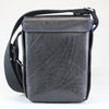 Compact Traveller Bag in Black Bridle Leather with Blue Stitch detail.